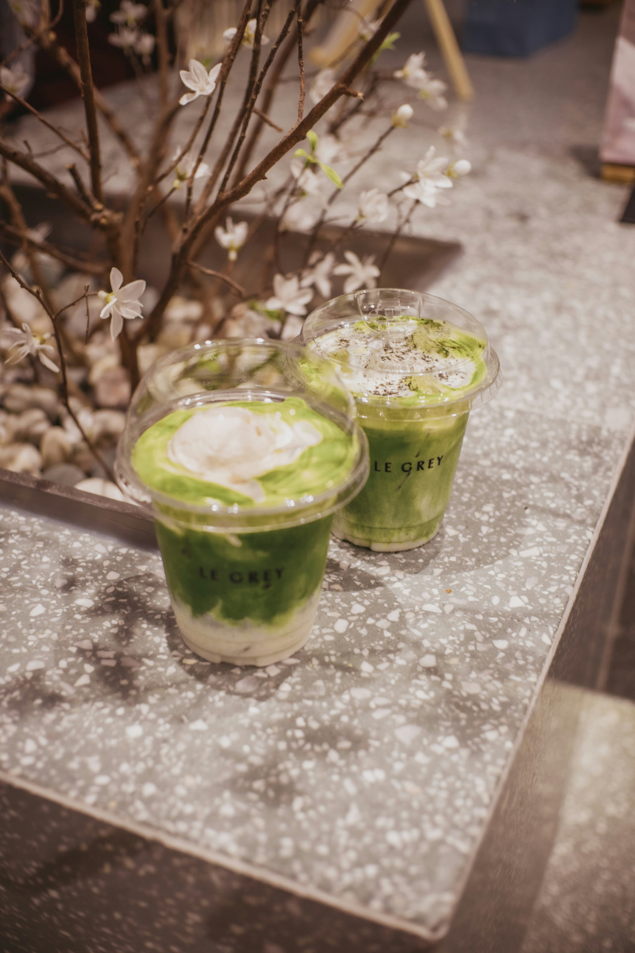 Iced matcha drinks in takeaway cups